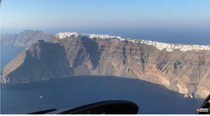 Views: Helicopter Flight Over Santorini, Greece (4K)
